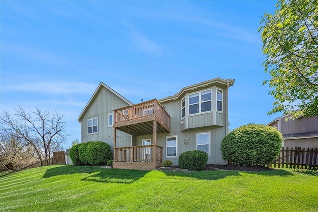 rear view of property with a balcony
