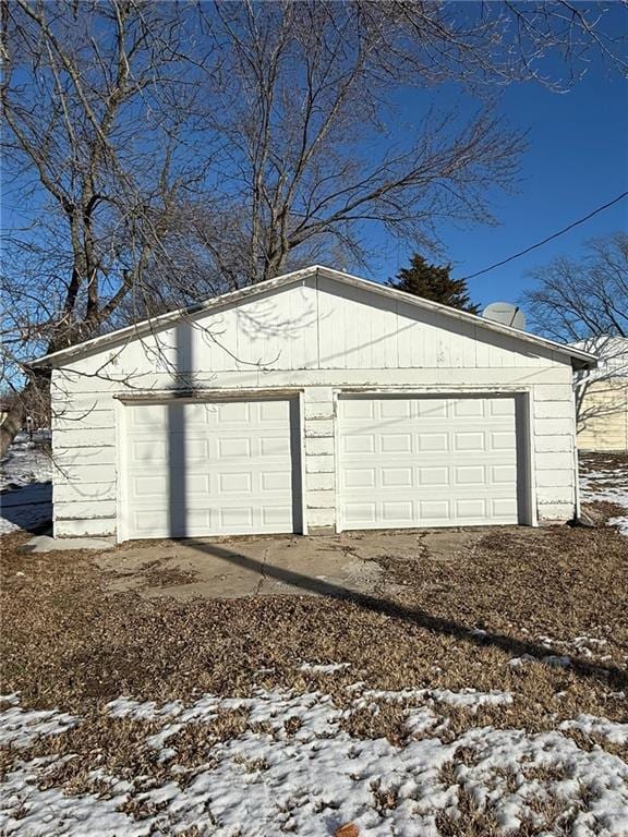 view of snow covered garage