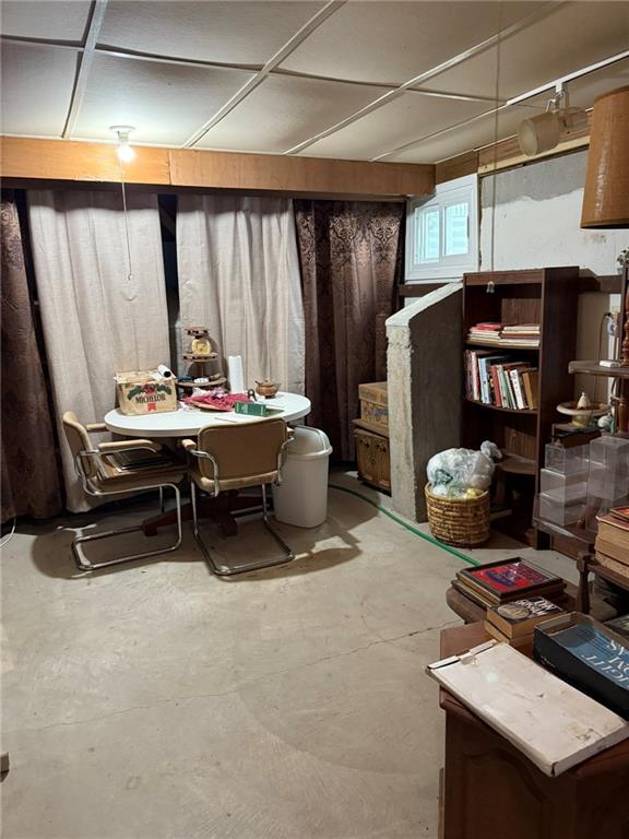 dining space with concrete flooring