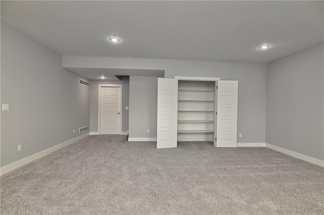 unfurnished bedroom with carpet floors