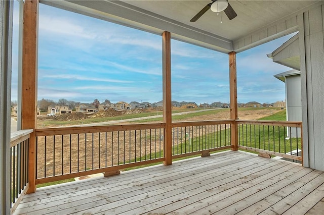 wooden terrace with ceiling fan