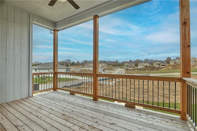 wooden deck with ceiling fan