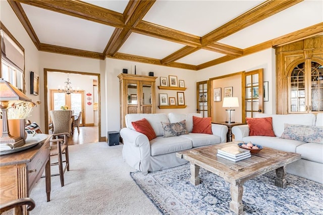 carpeted living area with beam ceiling, a notable chandelier, and coffered ceiling