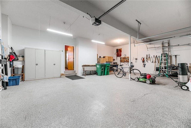 garage featuring a garage door opener