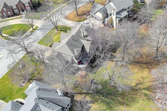 birds eye view of property with a residential view