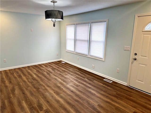 entryway featuring dark wood-type flooring