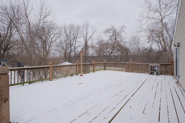 view of snow covered deck