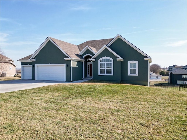 ranch-style house with an attached garage, concrete driveway, a front lawn, and fence