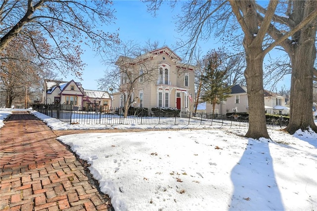 view of front facade with a fenced front yard and a residential view