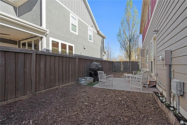 9011 NE 79th St, Kansas City, MO 64158 - view of yard with a fenced backyard and a patio