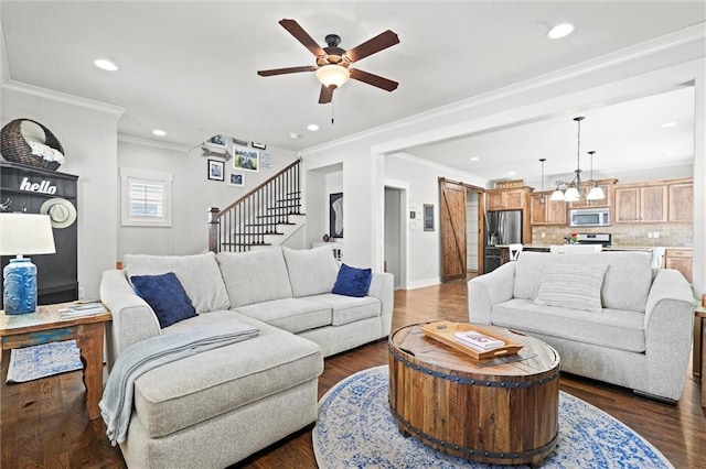 9011 NE 79th St, Kansas City, MO 64158 - living room with a barn door, ornamental molding, a ceiling fan, recessed lighting, and stairs