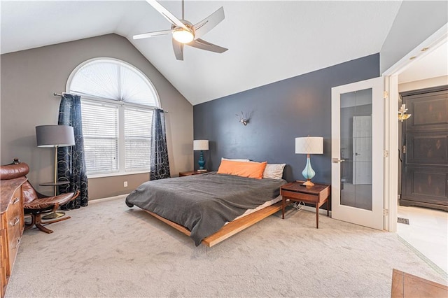 bedroom featuring lofted ceiling, ceiling fan, and carpet flooring