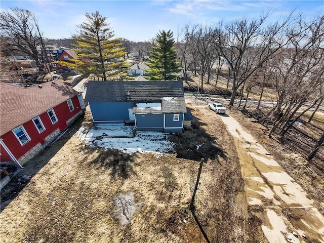 birds eye view of property with a residential view