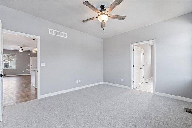 9630 N Colrain Ave, Kansas City, MO 64154 - unfurnished bedroom with visible vents, carpet, and baseboards