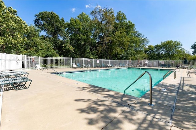 view of pool featuring a patio