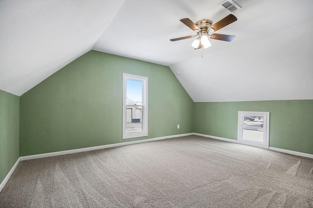 bonus room featuring ceiling fan, carpet, and lofted ceiling