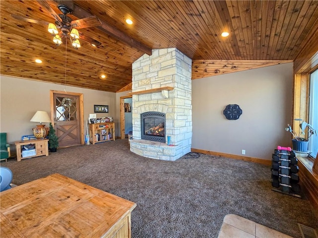 unfurnished living room with a stone fireplace, lofted ceiling with beams, wooden ceiling, carpet floors, and ceiling fan