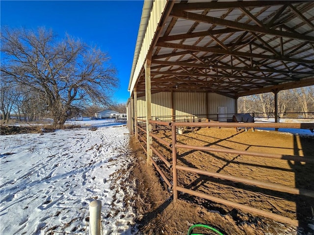 view of yard layered in snow