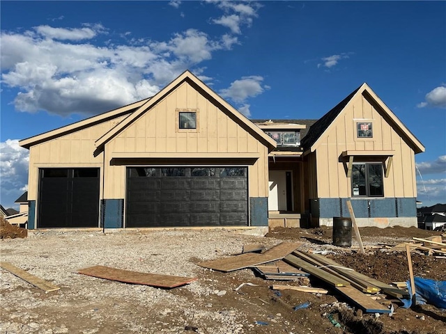 property under construction with board and batten siding