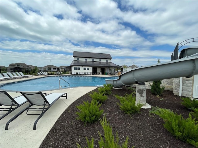 community pool with a patio