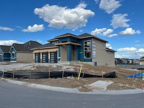 view of front of home with a garage