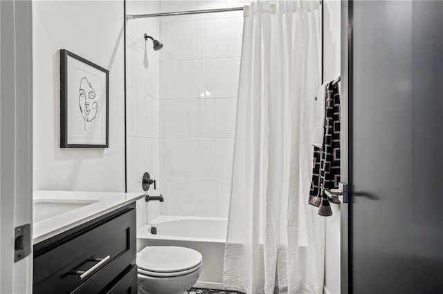 full bath featuring shower / tub combo with curtain, vanity, and toilet