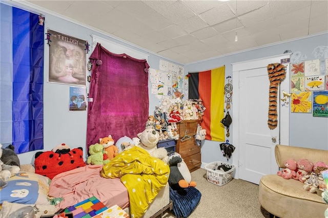 carpeted bedroom with crown molding