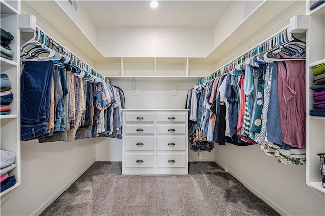 spacious closet featuring visible vents and carpet floors