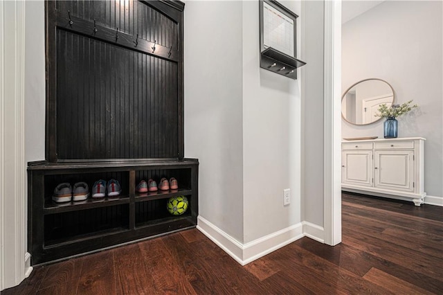 interior details with wood finished floors and baseboards