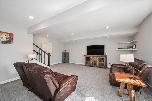 carpeted living room featuring stairway, recessed lighting, and baseboards