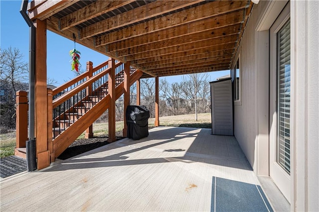 view of patio with stairs