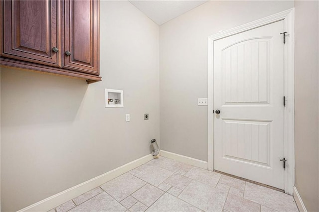 laundry area with hookup for a washing machine, cabinets, and hookup for an electric dryer