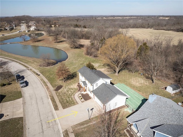 drone / aerial view with a water view