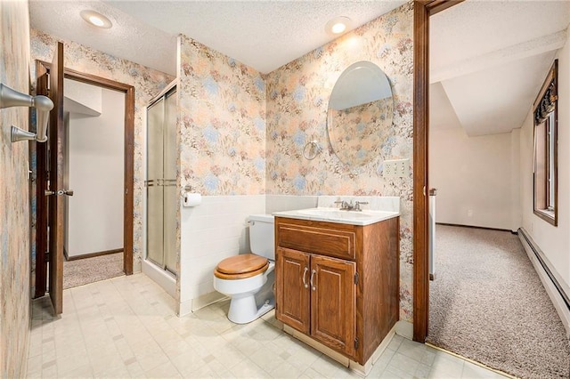 bathroom with toilet, an enclosed shower, a textured ceiling, and baseboard heating