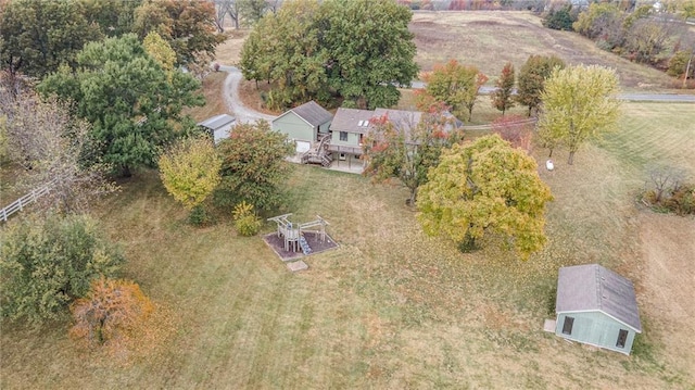 birds eye view of property featuring a rural view