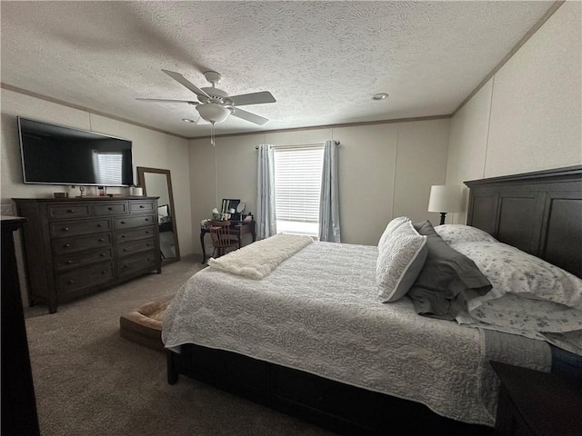 bedroom with ceiling fan, a textured ceiling, light colored carpet, and ornamental molding