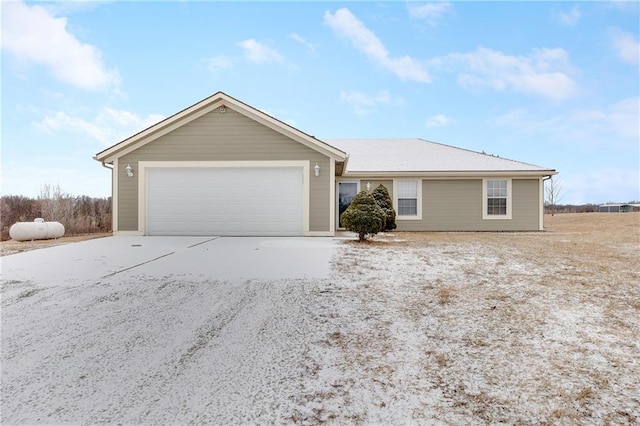 single story home with a garage