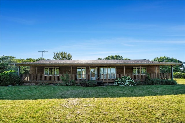 ranch-style house featuring a front yard