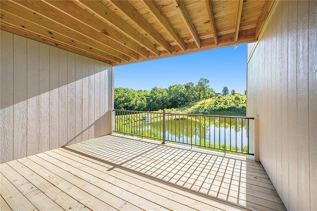 wooden terrace with a water view