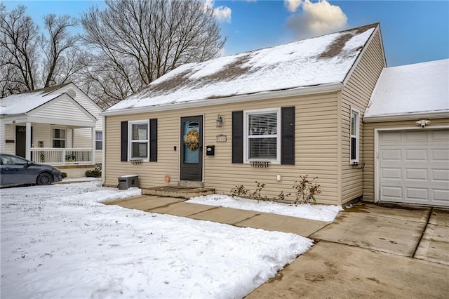 view of front of home with driveway and an attached garage