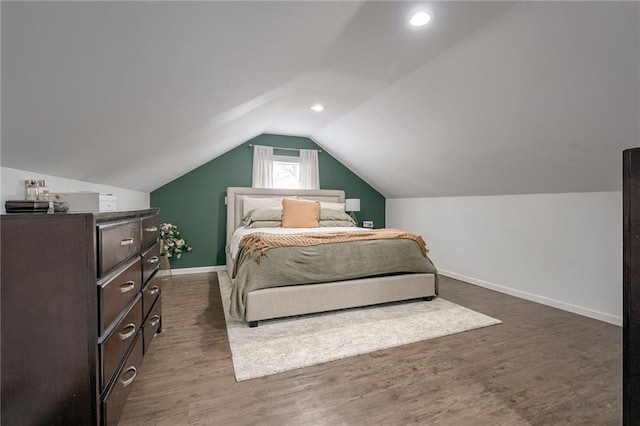 bedroom with lofted ceiling, dark wood-style floors, baseboards, and recessed lighting