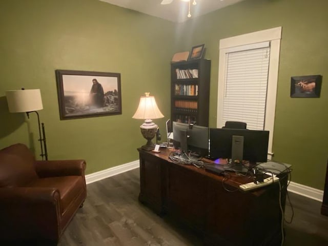 office space with dark wood-type flooring and ceiling fan