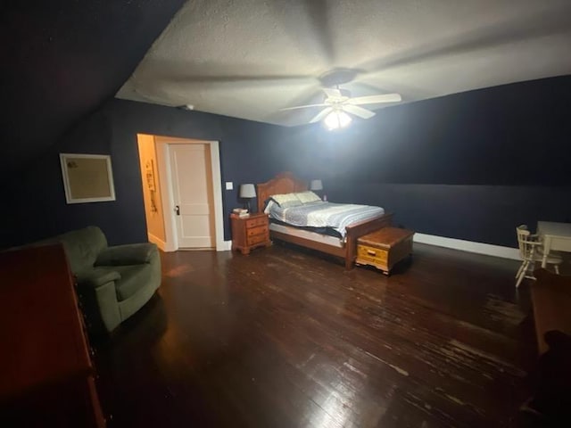 bedroom featuring dark wood-type flooring and ceiling fan