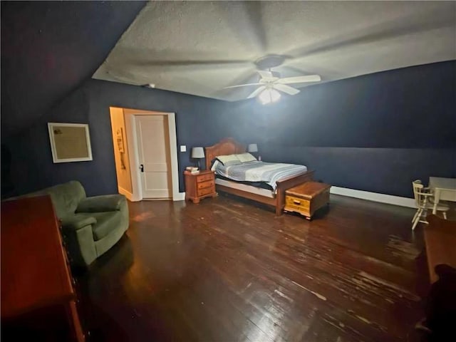 bedroom featuring dark hardwood / wood-style floors and ceiling fan