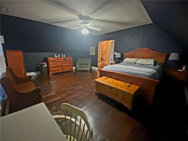 bedroom featuring dark wood-type flooring and ceiling fan