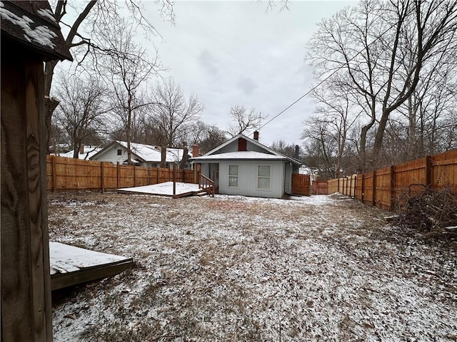 view of yard layered in snow