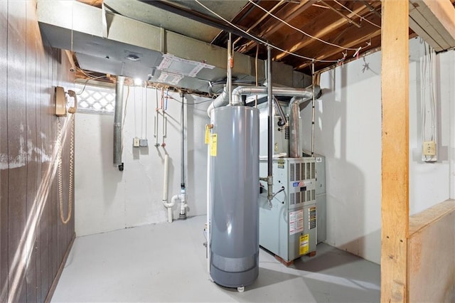 utility room with water heater