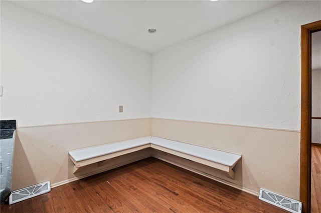 misc room featuring recessed lighting, visible vents, and wood finished floors