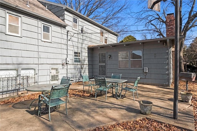 view of patio featuring outdoor dining space