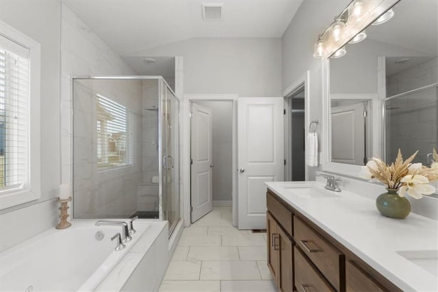 full bathroom with a healthy amount of sunlight, visible vents, a sink, and a shower stall